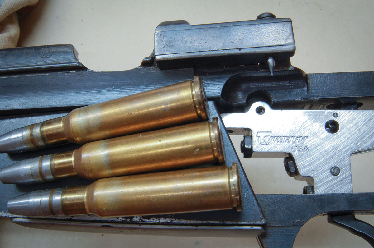 Cartridge rims align, as shown here, in the slanted magazine box.